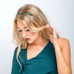 Błyszcząca szmaragdowa opaska do włosów.