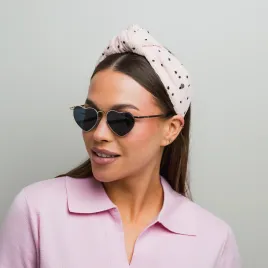 Opaska z wiązaniem baby pink w kropeczki.