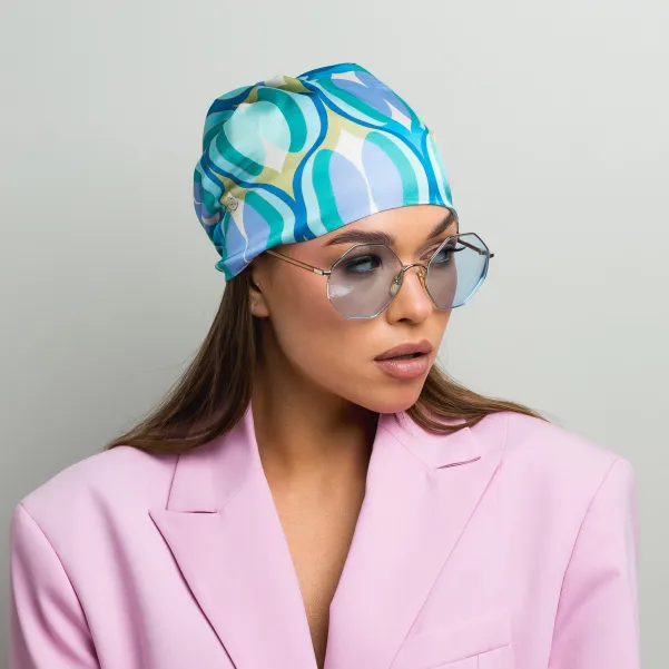 Modowa turkusowa chusta-turban na głowę z wiązaniem.