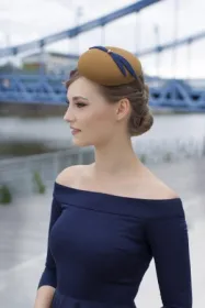 Kobiece nakrycia głowy we francuskiem stylu